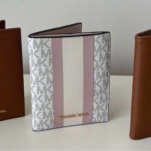 Michael Kors passport holders in Tan or Pink with logo